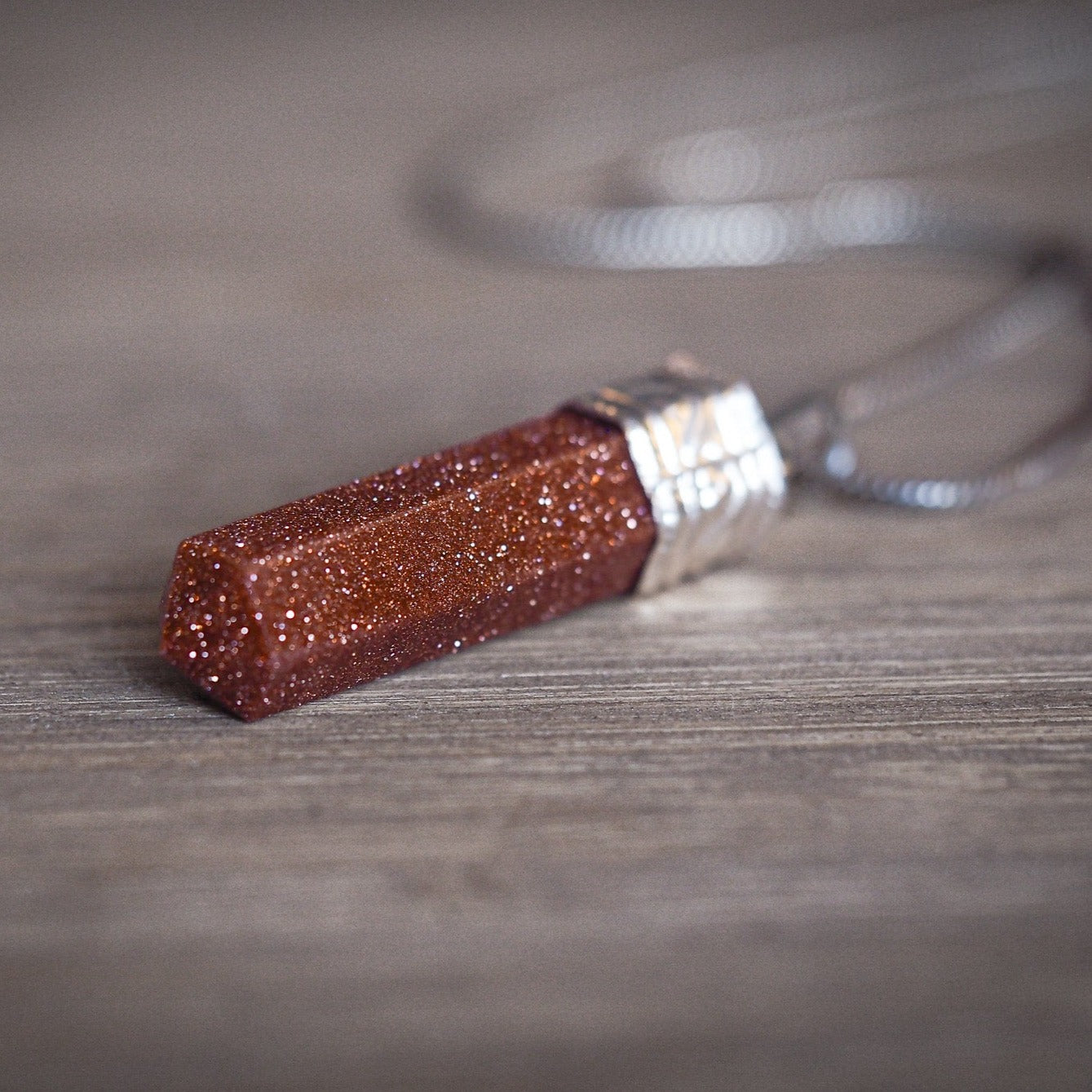 Stone pendant, Red gold stone